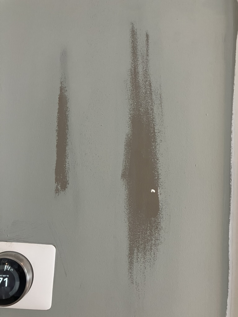 PVA primer wiped off painted wall with damp rag