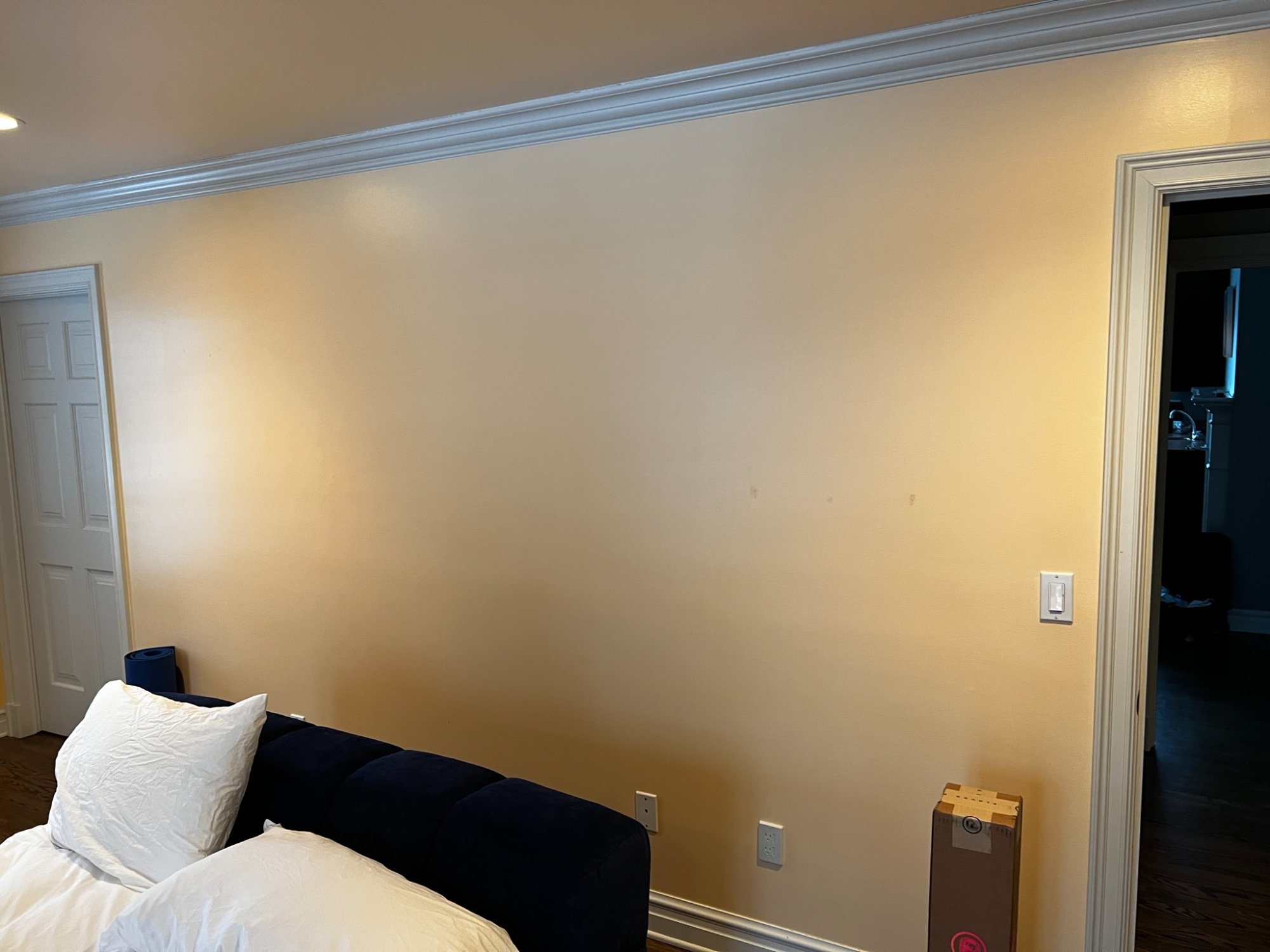 bedroom wall before wallpaper prep