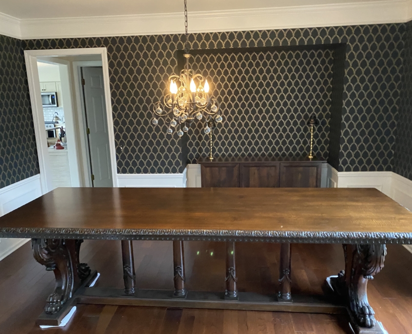 Henry Ford's table with dark charcoal and gold laurel leaf wallpaper installed by Barry Bernau of Bernau Designs in Southeast Michigan