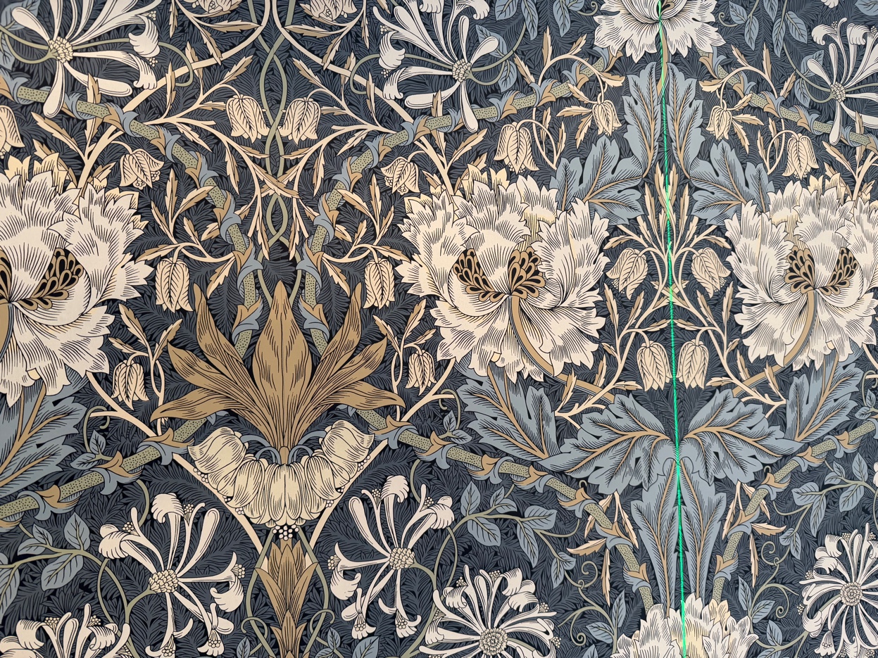 Seamless pattern matching across Morris & Co. Honeysuckle & Tulip wallpaper, with the design reading as one continuous floral.