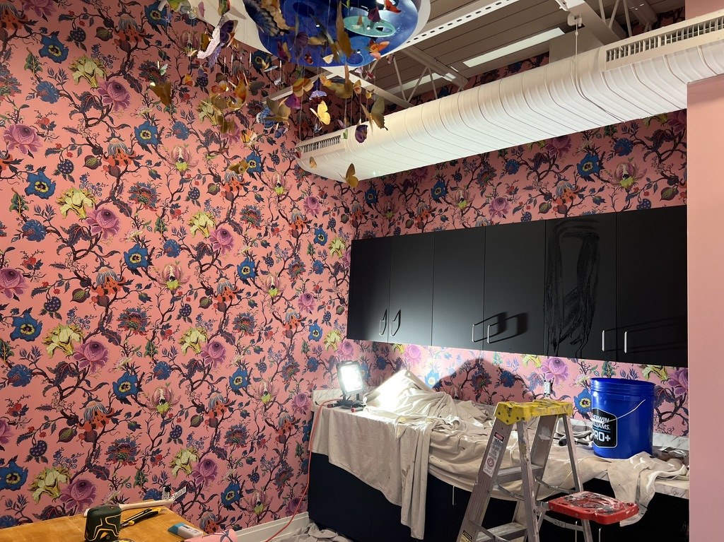 House of Hackney floral wallpaper on a pink ground installed in a commercial interior at GlamJail, Birmingham, Michigan, by Bernau Designs.