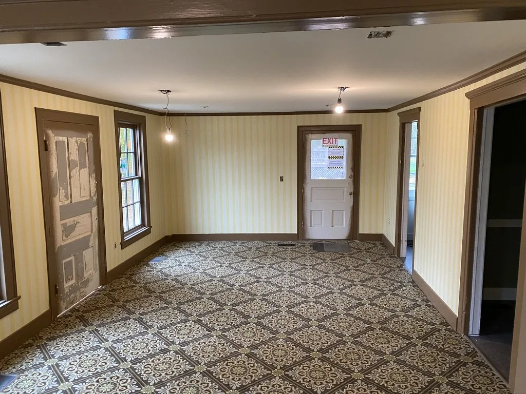 Thibaut Kensington Stripe wallcovering on the walls of a first-floor room in the Niles-Barnard House, Troy, Michigan.